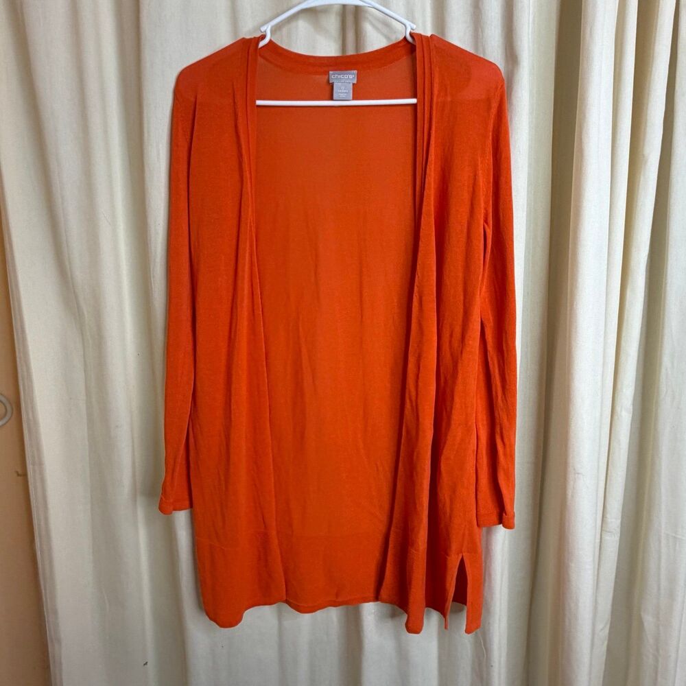 Chicos size 0 women’s orange Cardigan